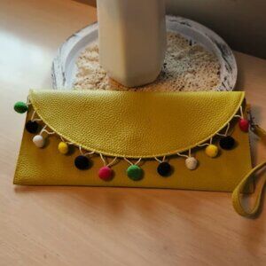 Mainstreet Collection MSC Yellow Pebble Grain Pleather clutch wristlet pom
